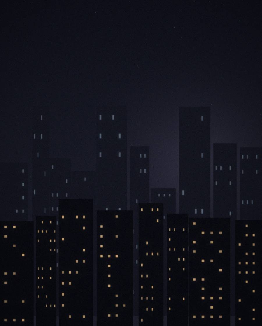 Tall lit buildings at night